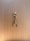 Load image into Gallery viewer, Sparkly Wishbone Braid Charm
